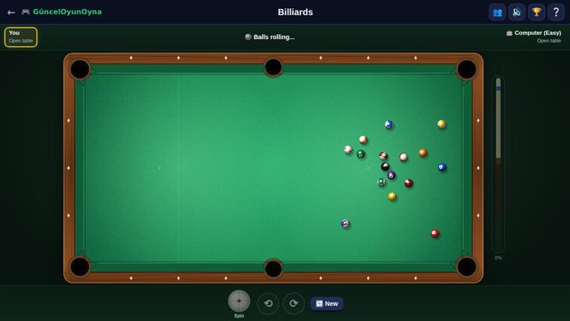 Billiards solids and stripes spread across the table