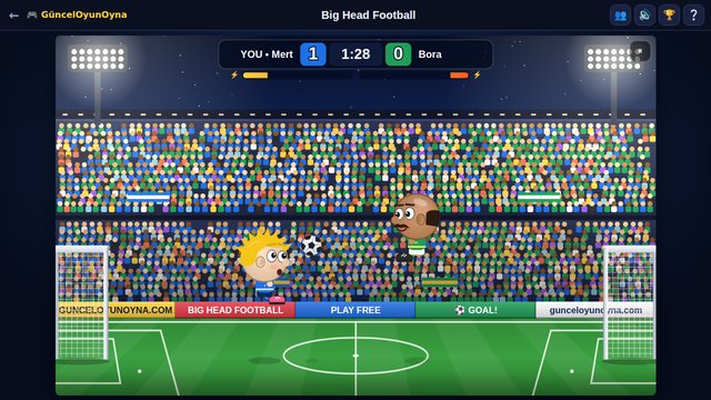 Big Head Football one-on-one match in a floodlit stadium