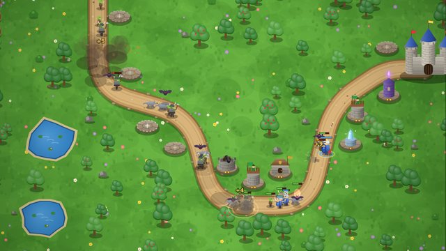 Castle Defense archer and wizard towers stopping a goblin wave in the green vale