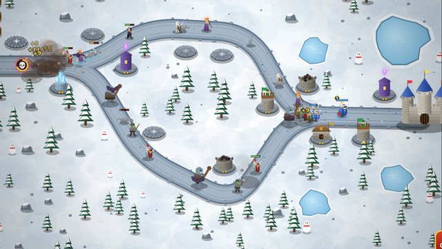 Castle Defense towers, hero and an enemy army in the snowy pass